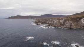 Spectacular 4K aerial video of flying above picturesque cliffs on the coast of Atlantic Ocean