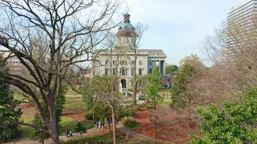 Aerial revealing shot of the South Carolina State House in Columbia. The South Carolina State House is the building housing the government of the U.S. state of South Carolina