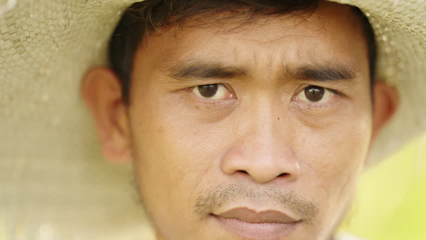 Closeup Portrait of Happy Young Asian Male Farmer, Smiling at the Camera