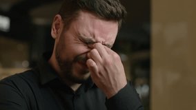 Close up anxious stressed Caucasian man tired upset guy rub dry irritated eyes feel pain ache eye strain sad male businessman crying tears bad vision discomfort suffer astigmatism syndrome headache - Powered by Shutterstock - Get 15% off with code: PIKWIZARD15