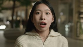Portrait shocked confused frightened Asian woman japanese chinese korean girl astonish wonder amazed scared female with big eyes open mouth unexpected news shock surprised lady astonishing reaction - Powered by Shutterstock - Get 15% off with code: PIKWIZARD15