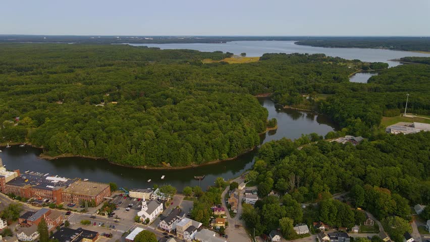 Newmarket town center aerial view at Main Street and Lamprey River with historic mills on the bank, Newmarket, New Hampshire NH, USA. 