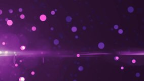 Abstract background of purple luminous particles and bokeh dots of festive energy magic, video 4k, 60 fps