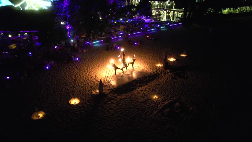 Aerial view of a fire show on the beach in Phuket, Thailand