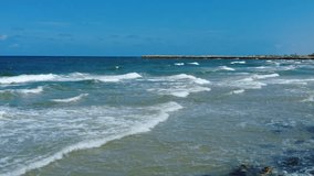 Time-lapse video of Mediterranean sea waves during the summer day.