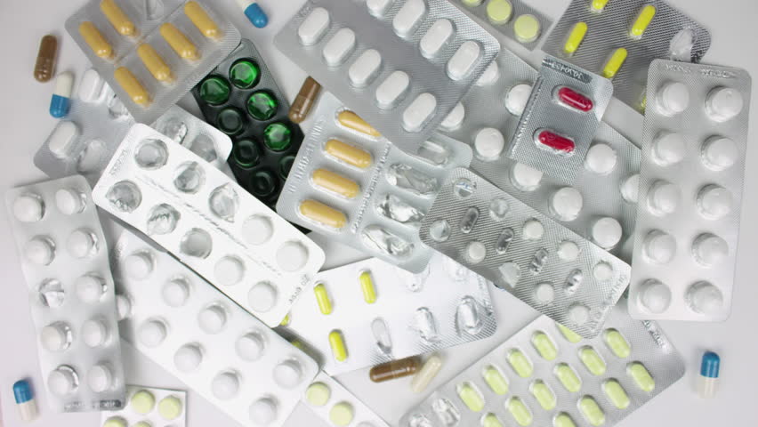 Pills blister pack close up. Health care concept. Stop motion animation. Too many tablets. Lot drug medicament. Cure flu medication. Pain killer bio medicine. Oral pill side effects. Take food pilule. Royalty-Free Stock Footage #1103237155