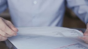 A businessman tears up a paper document. termination of the cooperation contract, paperwork in the office - Powered by Shutterstock - Get 15% off with code: PIKWIZARD15