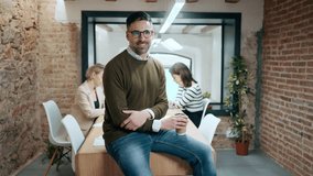 Video of successful architect team posing and looking at camera in a modern startup.