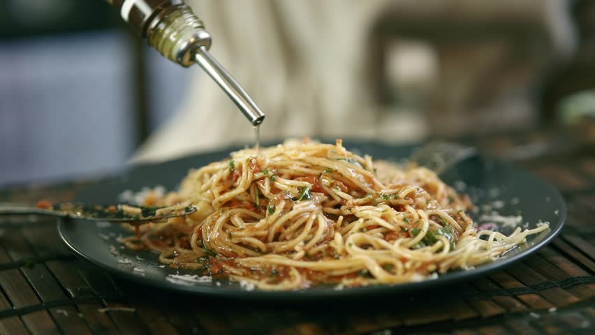 Chef Cooking Pasta Spaghetti On Kitchen. Gourmet Cooking Traditional Italian Pasta Bolognese With Olive Oil. Italian Cuisine Dinner Party. Taste Tomato Sauce In Pasta Spaghetti.Homemade Sauce For Meal Royalty-Free Stock Footage #1103251333