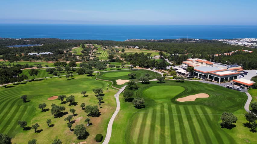 Golf courses. Beautiful green courses. North Cyprus Golf Club. Beautiful nature. Blue sea and a lot of greenery. Landscape. Golf.  Royalty-Free Stock Footage #1103256309