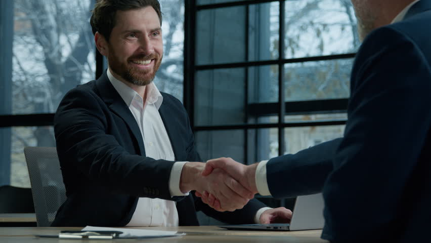 Caucasian businessman consultant employer talk client recruit business meeting man manager salesman banker shake hand handshake with unrecognizable customer make deal at office successful negotiation Royalty-Free Stock Footage #1103268331