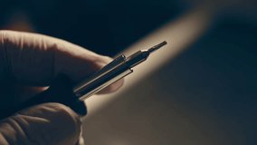 Steam transformation effect of Close-up. Screwdriver unscrews the screw from the computer hard drive. Male hands twists the screw on a computer hard drive with a screwdriver. Hands of master of repair - Powered by Shutterstock - Get 15% off with code: PIKWIZARD15