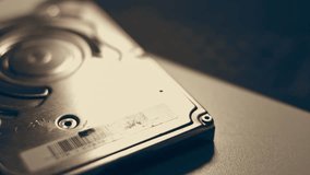 Steam transformation effect of Close-up. Screwdriver unscrews the screw from the computer hard drive. Male hands twists the screw on a computer hard drive with a screwdriver. Hands of master of repair - Powered by Shutterstock - Get 15% off with code: PIKWIZARD15