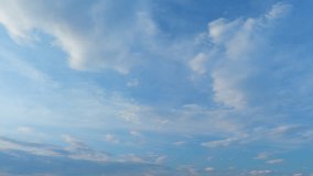 Clouds with blue light blue sky in horizon. No birds and free of defects. Cloudscape nature background texture. Time lapse. - Powered by Shutterstock - Get 15% off with code: PIKWIZARD15