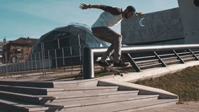 Young cool millennial man, teenager hipster in california rides his skateboard on boardwalk beach. Action wide shot of man perform skateboard tricks on sunny day in tourist spot - Powered by Shutterstock - Get 15% off with code: PIKWIZARD15