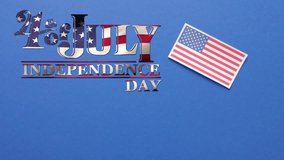 Animation of 4th of july text over flag of united states of america on blue background. American independence day, tradition and celebration concept digitally generated video.