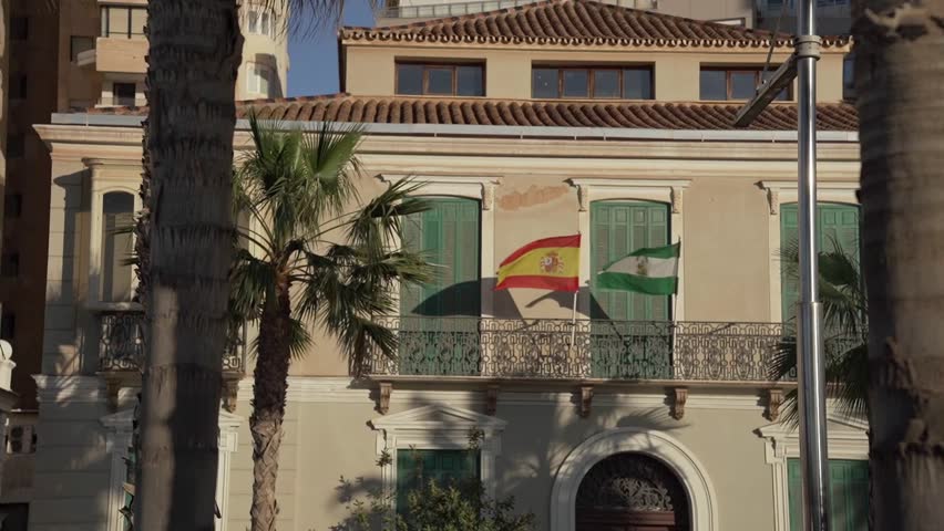 Spanish and Andalusian flags flying on Ministry of Agriculture, Livestock, Fisheries and Sustainable Development building