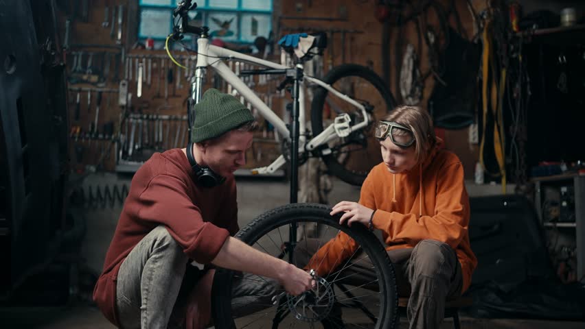 Bicycle Repair: Learning the Art and Science of Fixing Wheels with Expert Guidance and Hands-On Training for Hobbyists, Enthusiasts, and Commuters Royalty-Free Stock Footage #1103316337