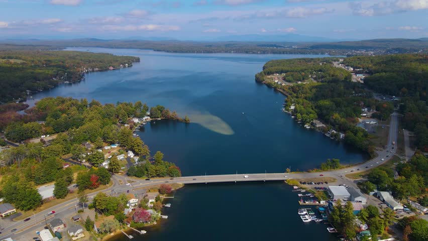 Aerial view of Lake Winnisquam and Winnisquam Sand Bar with US Route 3 bridge between town of Belmont and Sanbornton in New Hampshire NH, USA. 