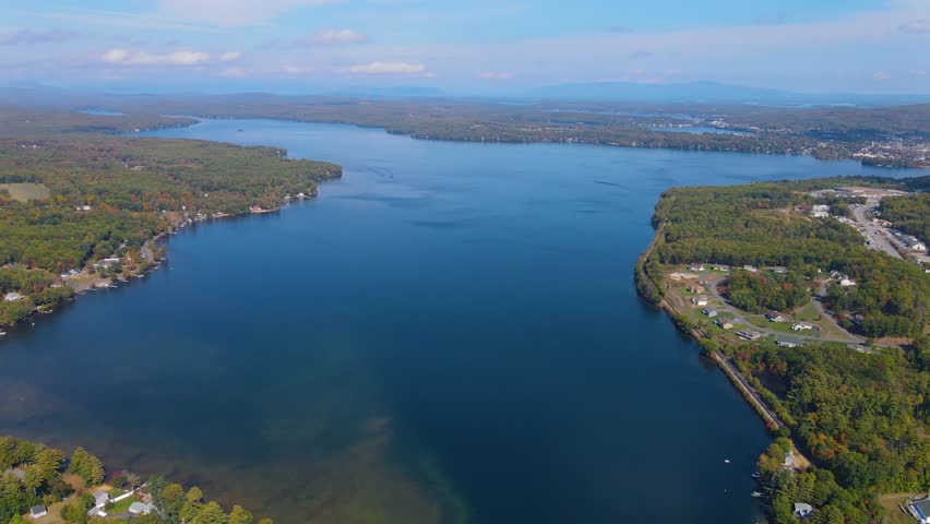 Aerial view of Lake Winnisquam and Winnisquam Sand Bar with US Route 3 bridge between town of Belmont and Sanbornton in New Hampshire NH, USA. 