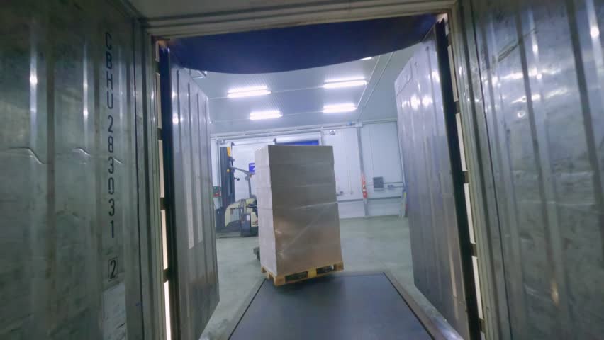 Workers in frozen food warehouse. Aerial drone fpv  - Powered by Shutterstock - Get 15% off with code: PIKWIZARD15