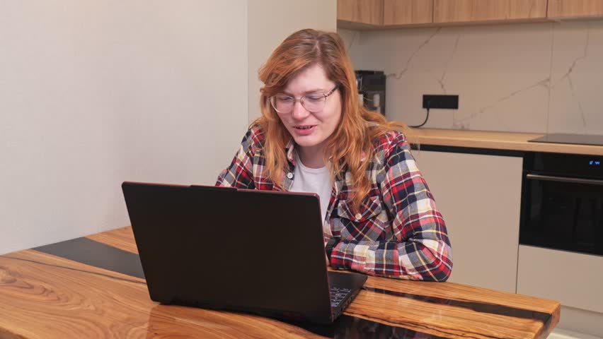 girl from home communicates remotely. girl at laptop