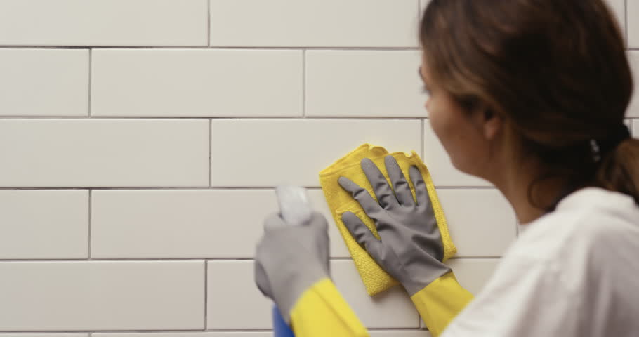 Houseworker wipes the surface with a napkin Royalty-Free Stock Footage #1103323763