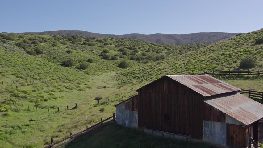 Abandoned Barn in the Green Hills of Carrizo Plain in California