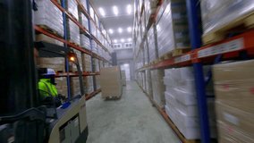 FPV drone view of forklifts moving frozen food cargo in huge warehouse - Powered by Shutterstock - Get 15% off with code: PIKWIZARD15