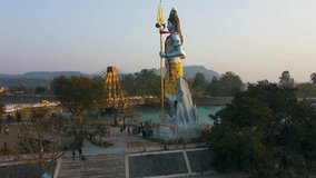 hindu god shiva statue with bright blue sky background at morning from different angle video is taken at haridwar uttrakhand india on Mar 15 2022.