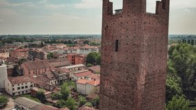 Stunning aerial video capturing the iconic and historic tower of Rovigo, a symbol of Italy's rich cultural heritage and architecture