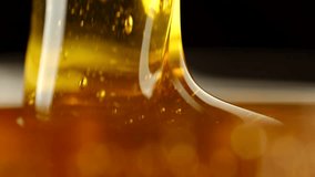 Thick Honey Dripping close up. Pouring honey, macro - Powered by Shutterstock - Get 15% off with code: PIKWIZARD15