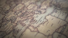 Italy on a vintage political world map. Slow motion, tracking arc shot. - Powered by Shutterstock - Get 15% off with code: PIKWIZARD15