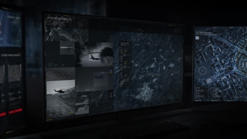 The Newest Army Software is Used for Geopositional Analysis. The Army is Searching for the Location of the Enemy. The Army has Accessed the Satellite Footage of the Air Base. Monitors. User Interface. | Shutterstock HD Video #1103345451