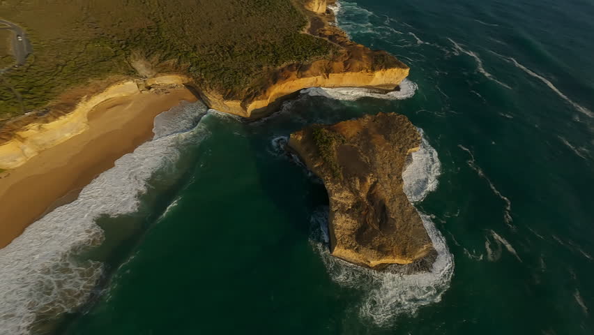Sandy cliff near the ocean in Australia.