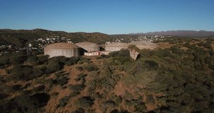 4K aerial drone video savanna hills, old water storage reservoirs in Klein Windhoek residential suburb in Namibia's capital in Namibia, southern Africa