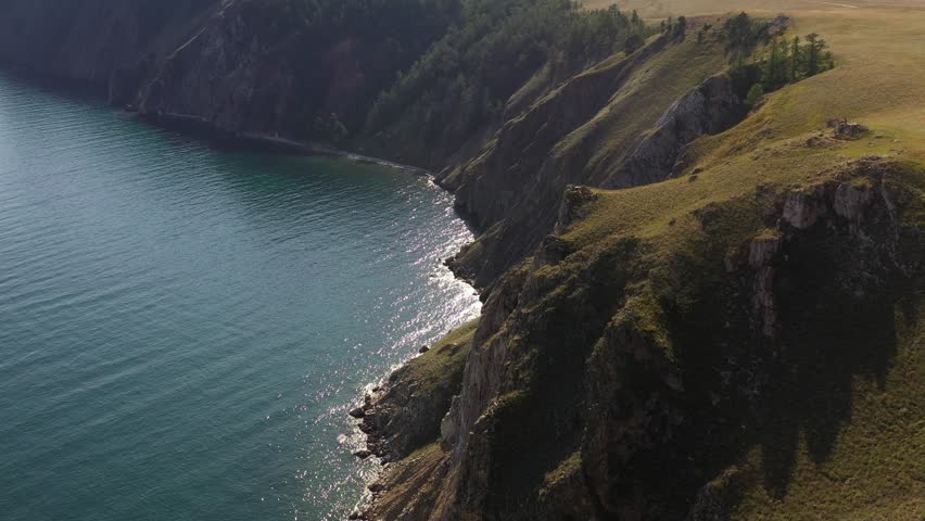 Rocky steep shore. Lake Baikal. Siberia, Russia.