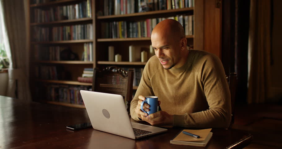 Business laptop, thinking and black man in office trying to solve problem. Idea, focus and contemplating solution, pensive or lost in thoughts alone. | Shutterstock HD Video #1103373011