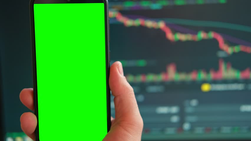 Black phone with blank mockup screen on rising stock graph. Closeup hand showing smartphone isolated green display. Online banking, Fund App use. Financial analyst on Invest Market. Bank collapse 2023 - Powered by Shutterstock - Get 15% off with code: PIKWIZARD15