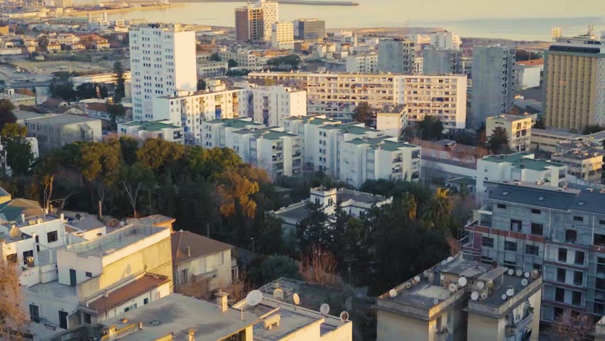 panoramic shot of the city of Algiers at sunrise with beautiful colors of the sky - SLOW MOTION