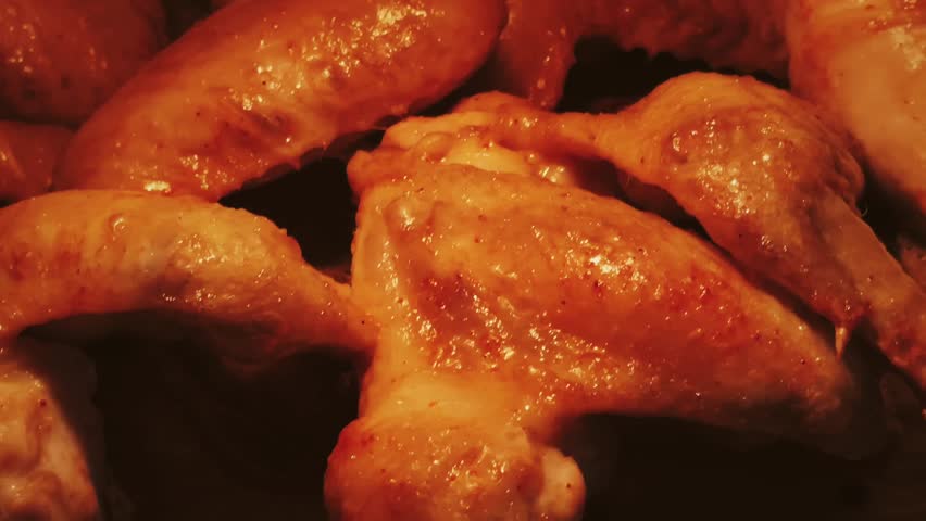 Chicken wings being roasted in the oven Royalty-Free Stock Footage #1103390855