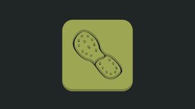 Green Human footprints shoes icon isolated on black background. Shoes sole. 4K Video motion graphic animation.