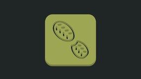 Green Human footprints shoes icon isolated on black background. Shoes sole. 4K Video motion graphic animation.