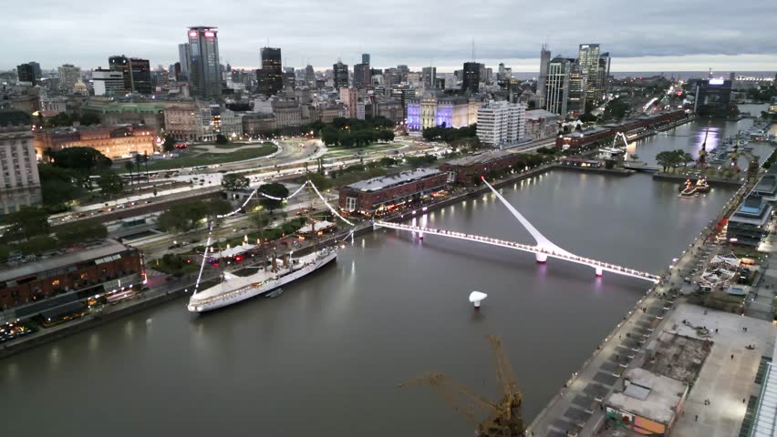 Aerial Drone Fly Above Puerto Madero Dock, Woman