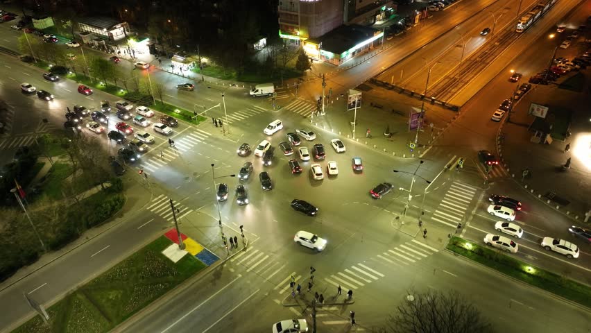 Motion Of Traffic In The Iuliu Maniu Boulevard And Lujerului Street At Night In Bucharest, Romania. - aerial