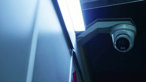 A round-lensed CCTV security camera was stationed in the city to ensure safety at night - Powered by Shutterstock - Get 15% off with code: PIKWIZARD15