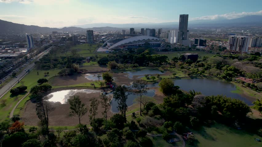 Beautiful aerial view of the Metropolitan Central Park La Sabana in Costa Rica, with side view of the national stadium 