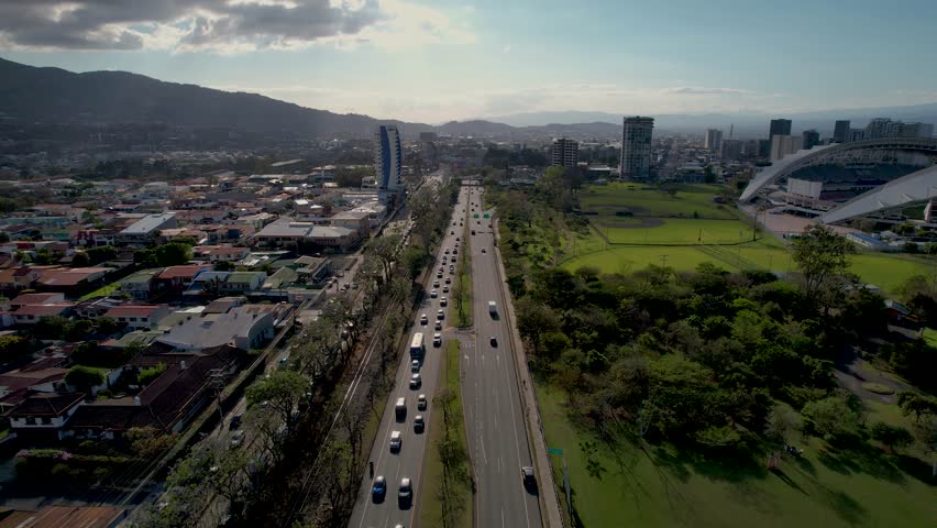 Beautiful aerial view of the Metropolitan Central Park La Sabana in Costa Rica, with side view of the national stadium 