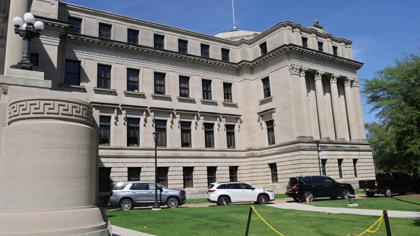 Mississippi State Capitol building in Jackson, Mississippi with pan right to left.