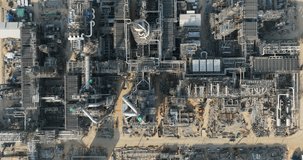 industrial plant construction project, crude oil and gas refinery new construction site large scale, aerial view drone shot, 4k video